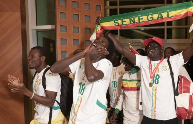 Senegalese football fans return home after royal pardon in Morocco