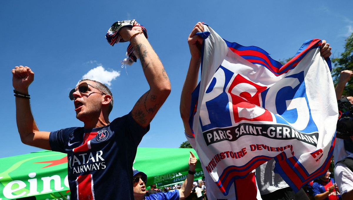 fans gathered at a stadium-like venue for the champions league final