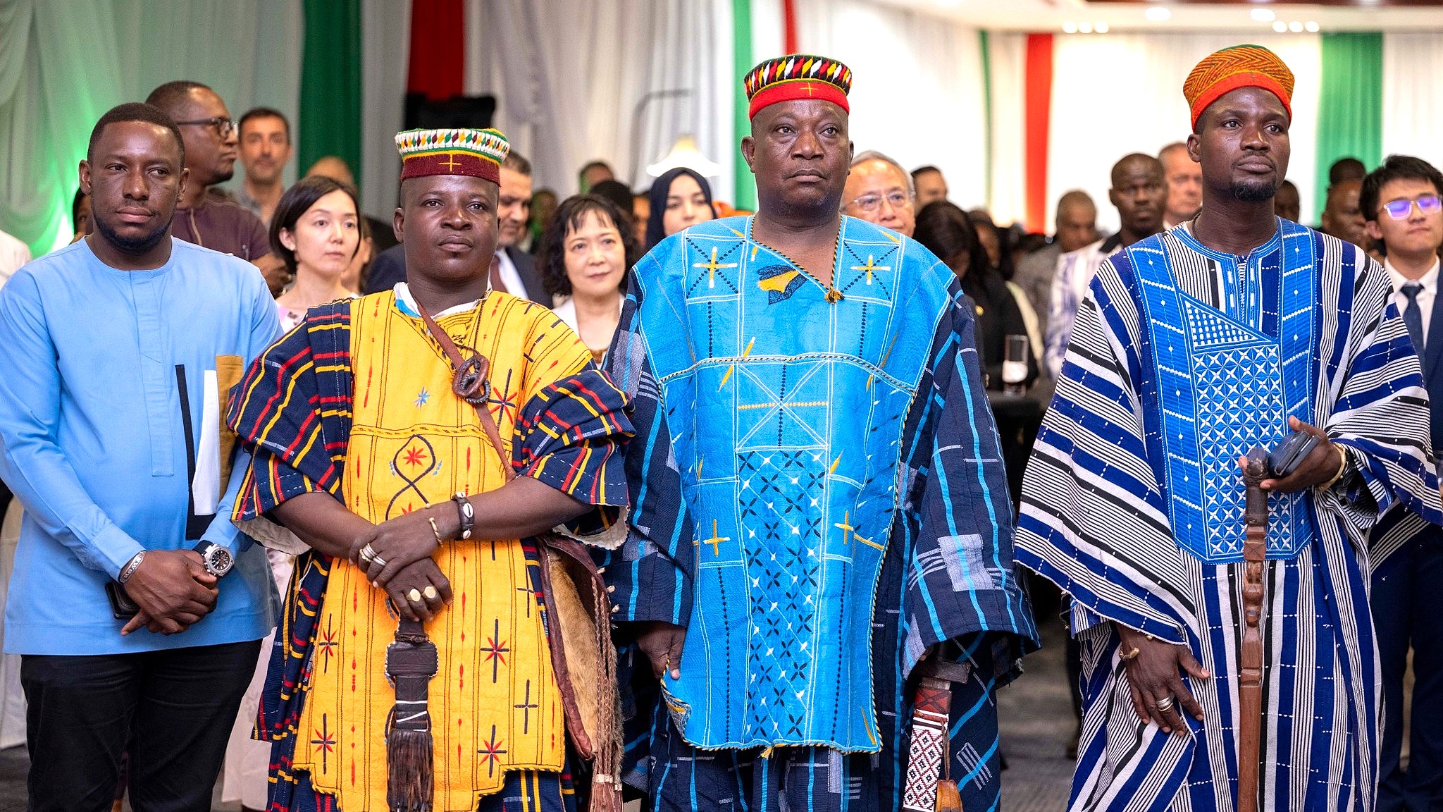 Burkinabè officials and Italian diplomats at a formal gathering