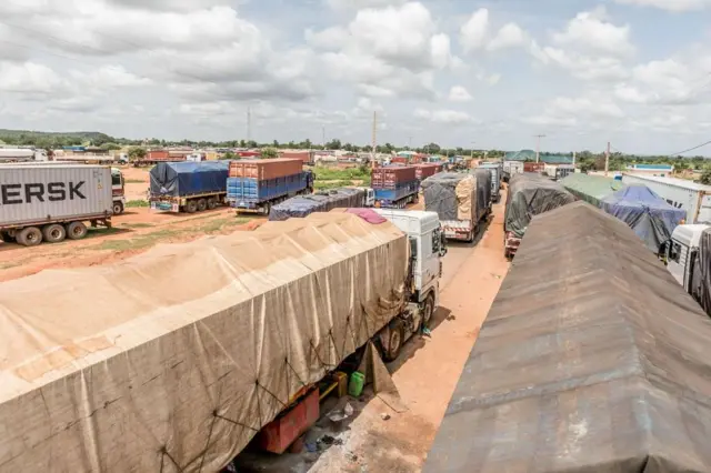 Long queues of trucks stranded at the closed Niger-Benin border in Malanville