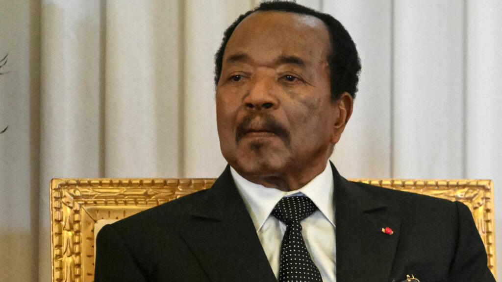 President Paul Biya of Cameroon observes Pope Leo XIV (off-camera) delivering a speech at the presidential palace in Yaoundé during a 11-day apostolic journey in Africa, April 15, 2026.