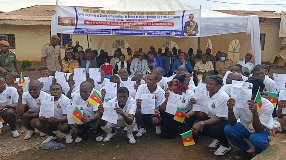 Group of young former prisoners celebrating their release in Cameroon