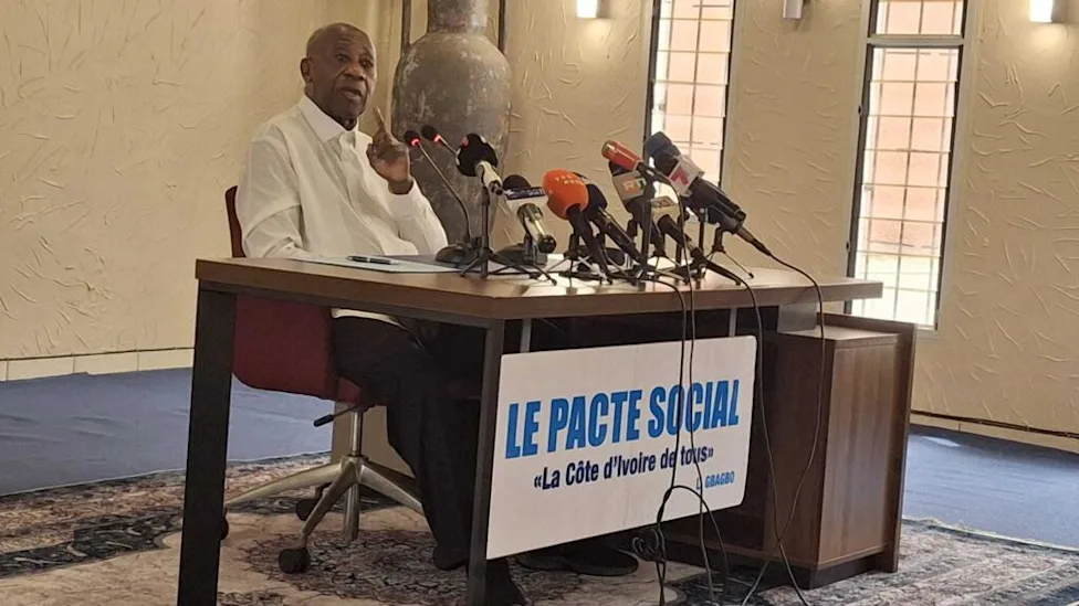 Laurent Gbagbo seated with members of the PPA-CI leadership team