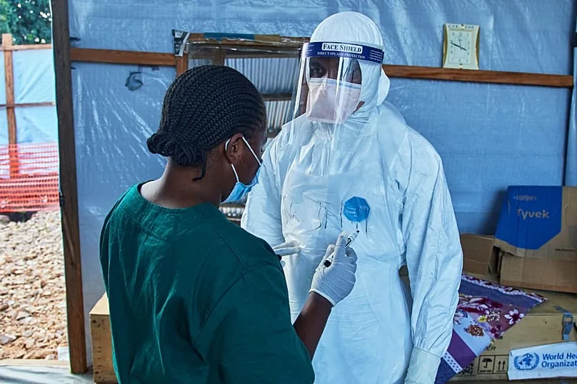 Healthcare workers discuss patient care at Bunia's Evangelical Medical Center in early July 2026