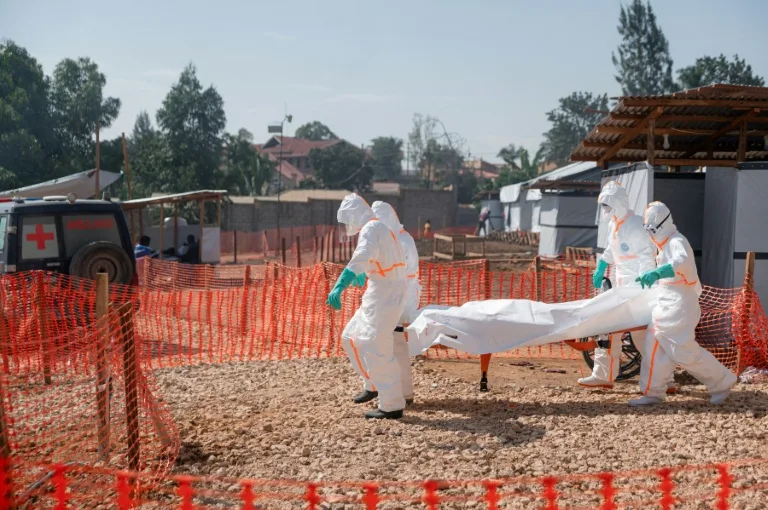Health workers in protective gear during an Ebola response drill